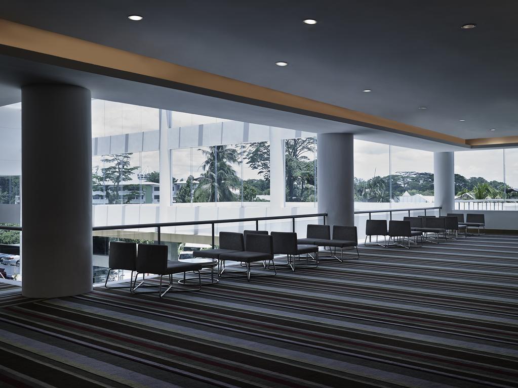 Pullman Kuching Hotel Kültér fotó Interior of the National Museum of Singapore